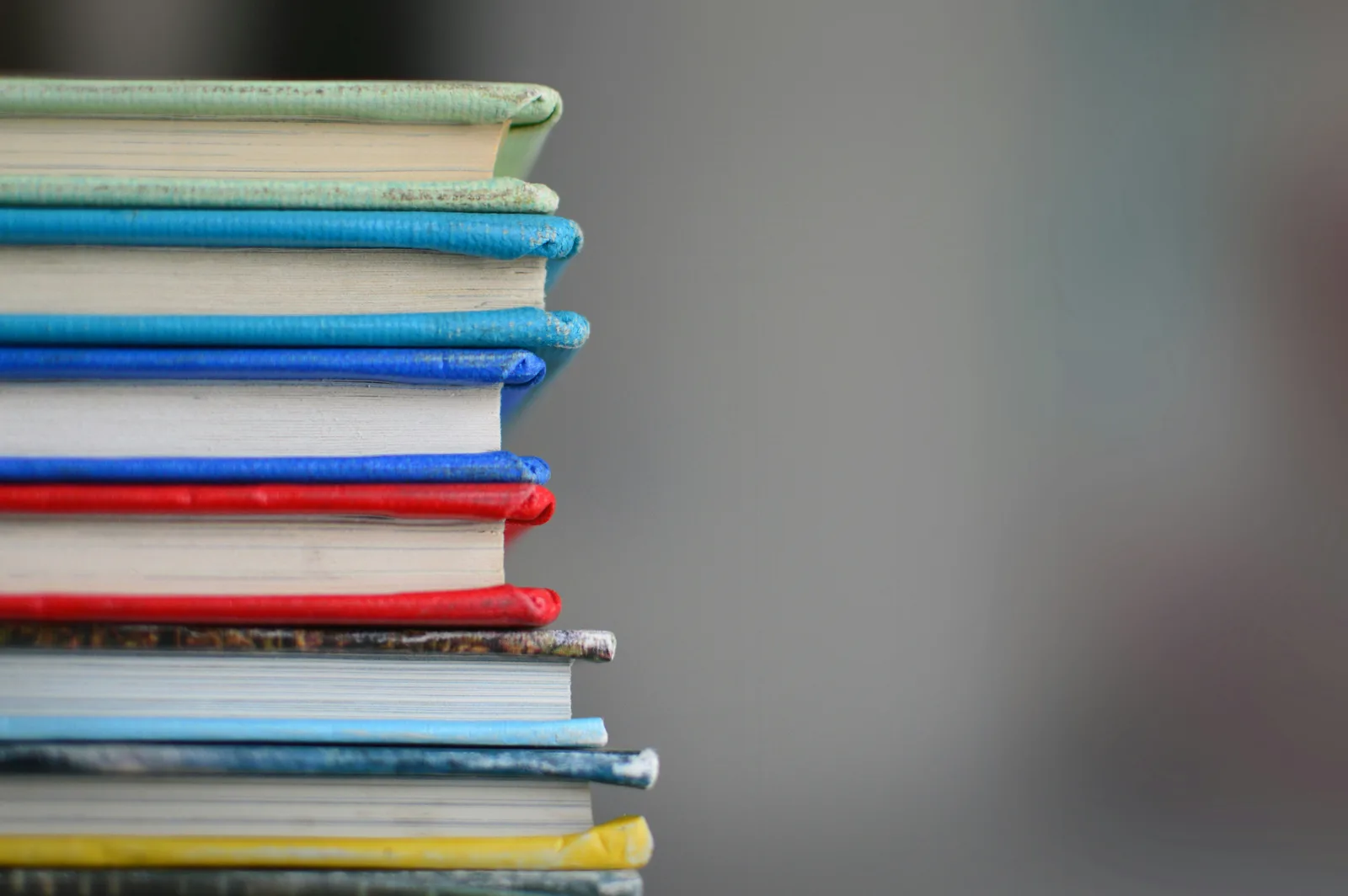 A stack of hardback books